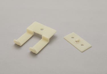 フレーム固定部品(自社製品)